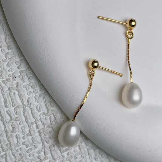 Boucles d'oreilles avec Perle Élégante