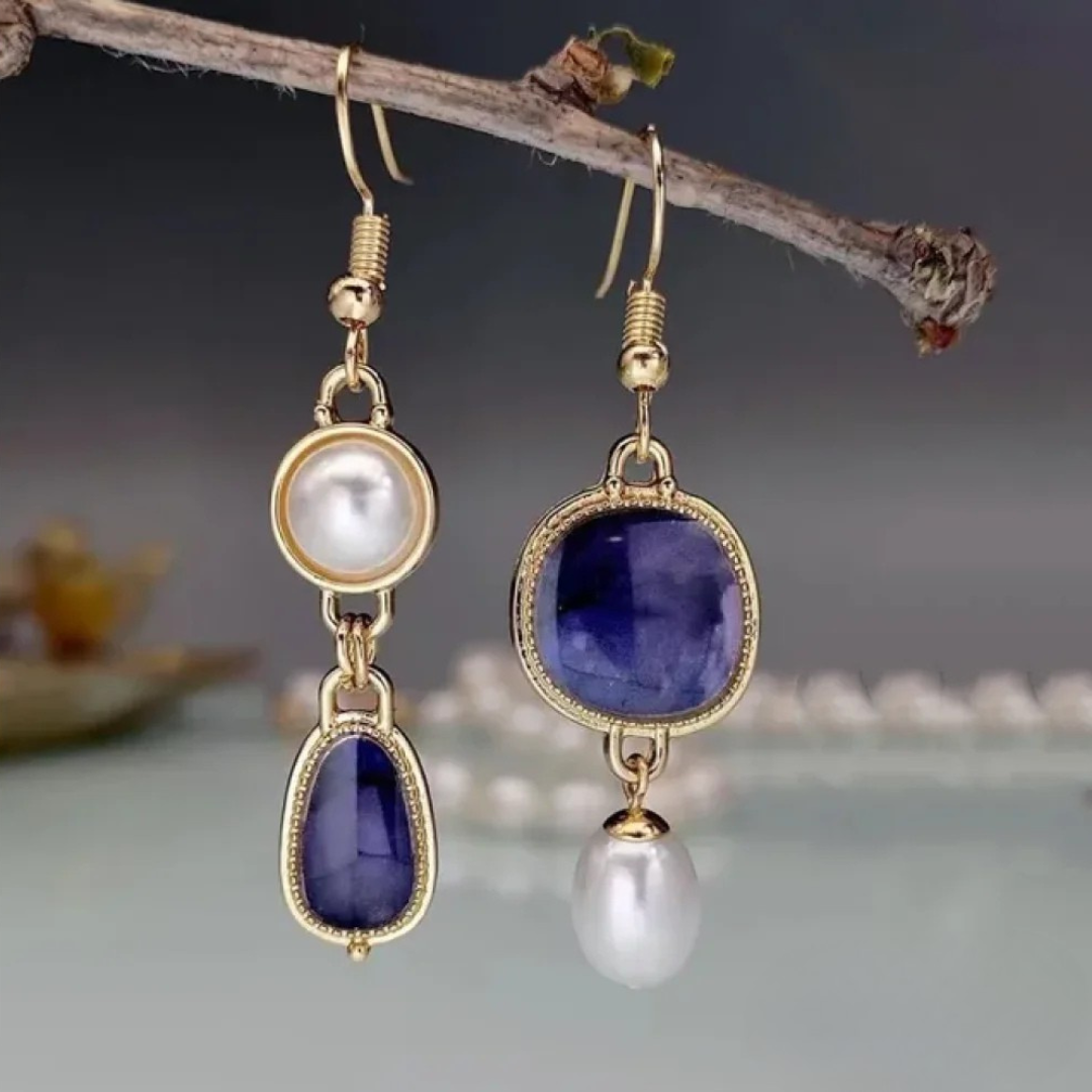 Boucles d'oreilles élégantes avec pierre bleue et perle