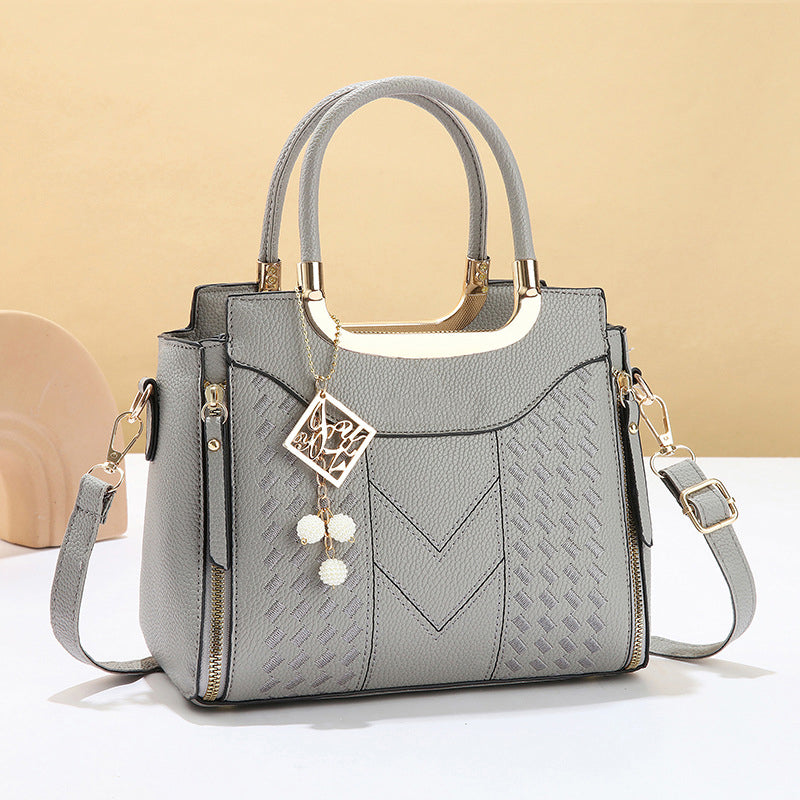 Bolso de Mano Costura en V